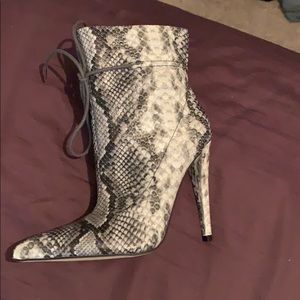 Black and white snakeskin booties